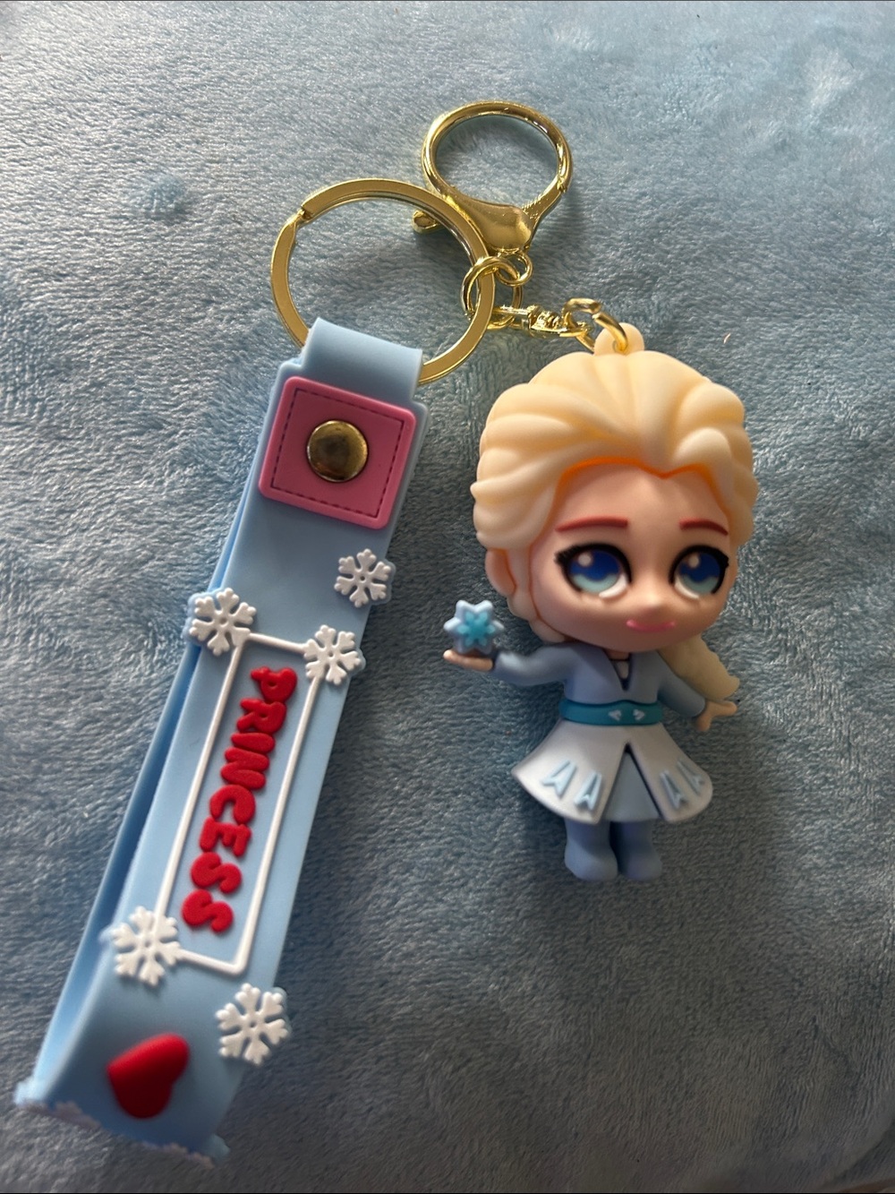 Disney Elsa PVC Keychain with Light Blue Wrist Strap and Gold Hardware
